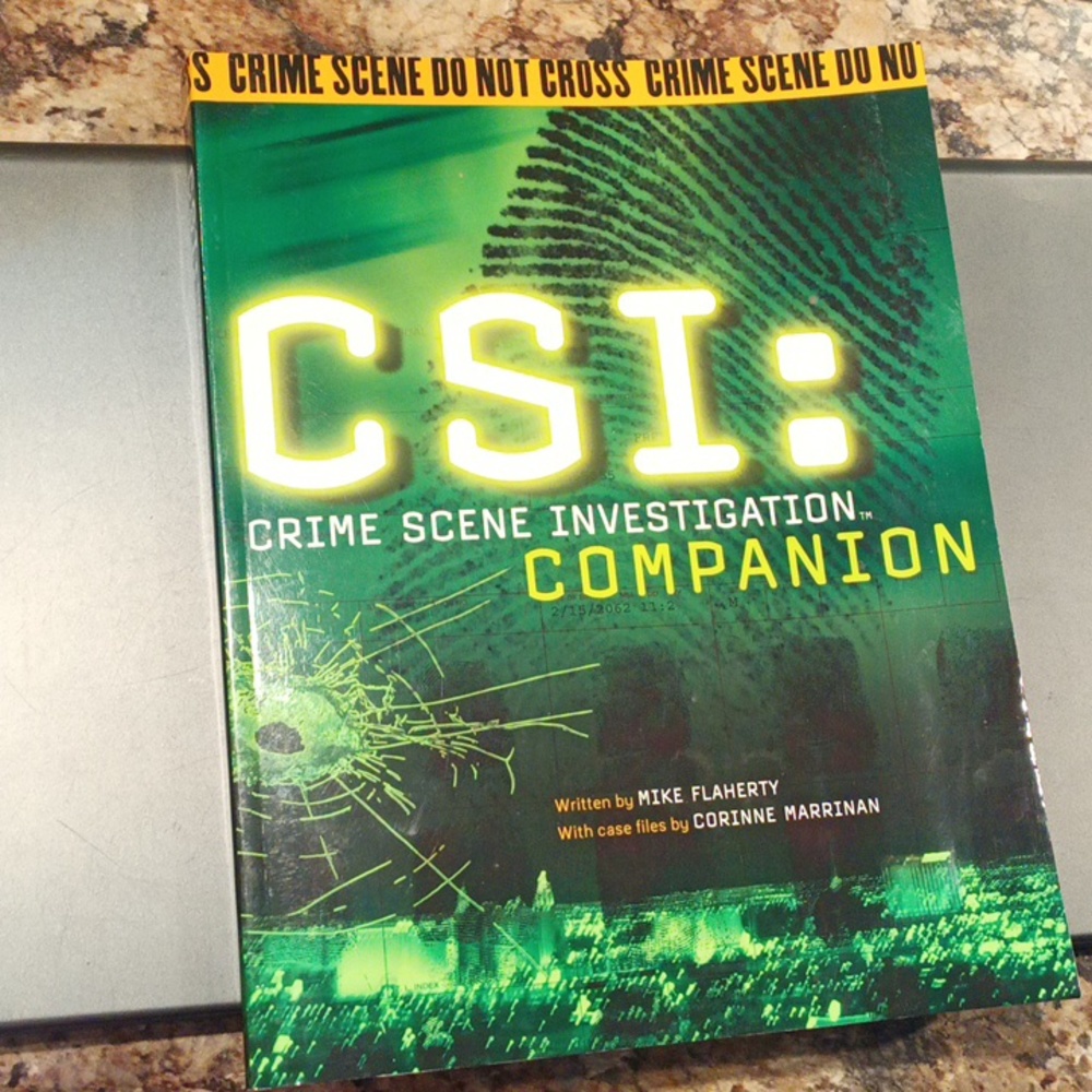 CSI: Crime Scene Investigation Companion by Mike Flaherty Paper Back Book.